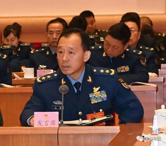 针对提升军事人力资源使用效益的问题,北部战区副司令员王伟代表在